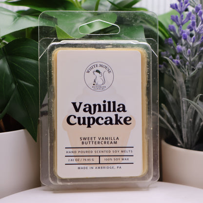 Vanilla Cupcake wax melt packaging with plants in the background